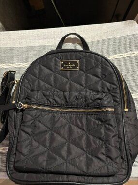Kate Spade mini, quilted, black backpack. Excellent condition.